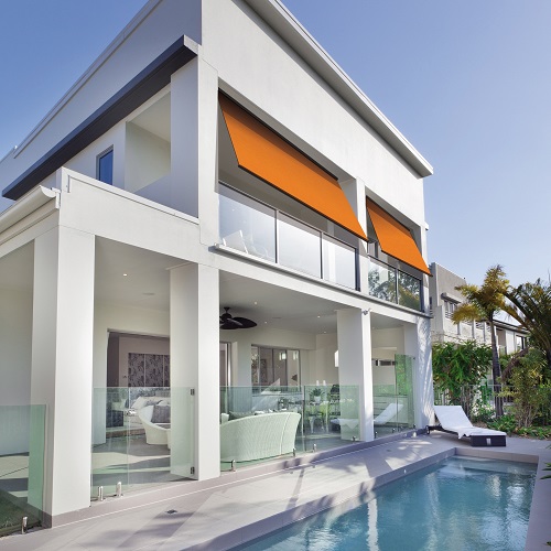 white modern villa with pool and original color monoblocs awning system 