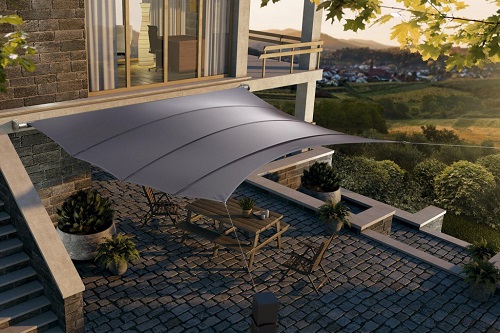 luxury and wind stable shade sail system in form of square provides shade to patio in front of the modern villa